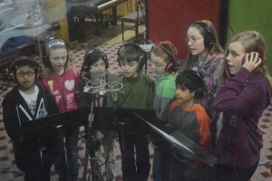 The kids singing backing vocals