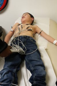 Noah getting an EKG at his pre-cath appointment.
