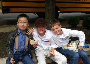 Noah with some friends on his first field trip - he had to dress like a pioneer and he had no idea what that was.