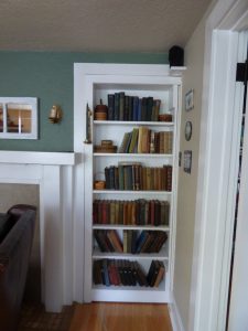 The innocuous looking bookcase in the living room